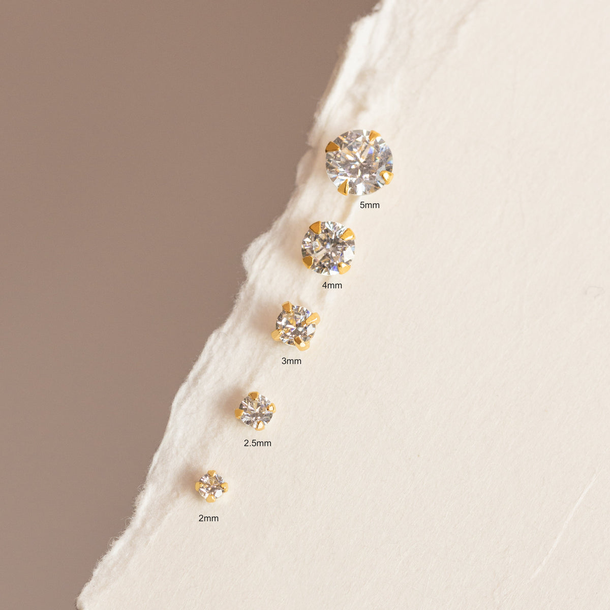Sloane - Mini Glitzerohrringe von 2mm
