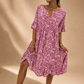 Lilian - Elegantes Kleid mit Blumenmustern und fließendem Design